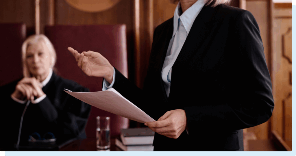 Attorney presenting documents at a commercial litigation trial