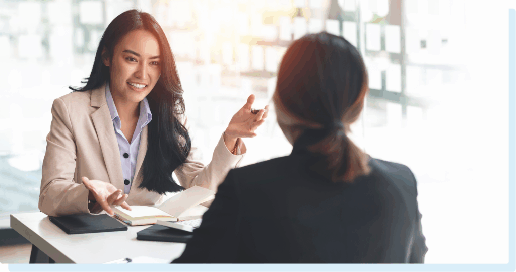 Experienced commercial litigation attorney consulting with client to develop dispute resolution strategy